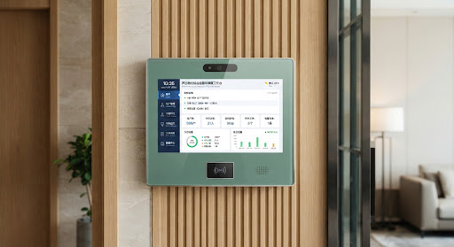 Modern smart access control panel unit mounted on an apartment residential lobby wall, sleek jade aesthetic